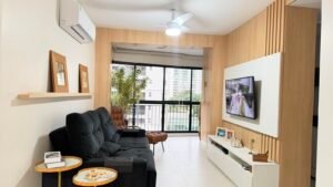 Sala de estar com varanda no Maayan Cidade Jardim