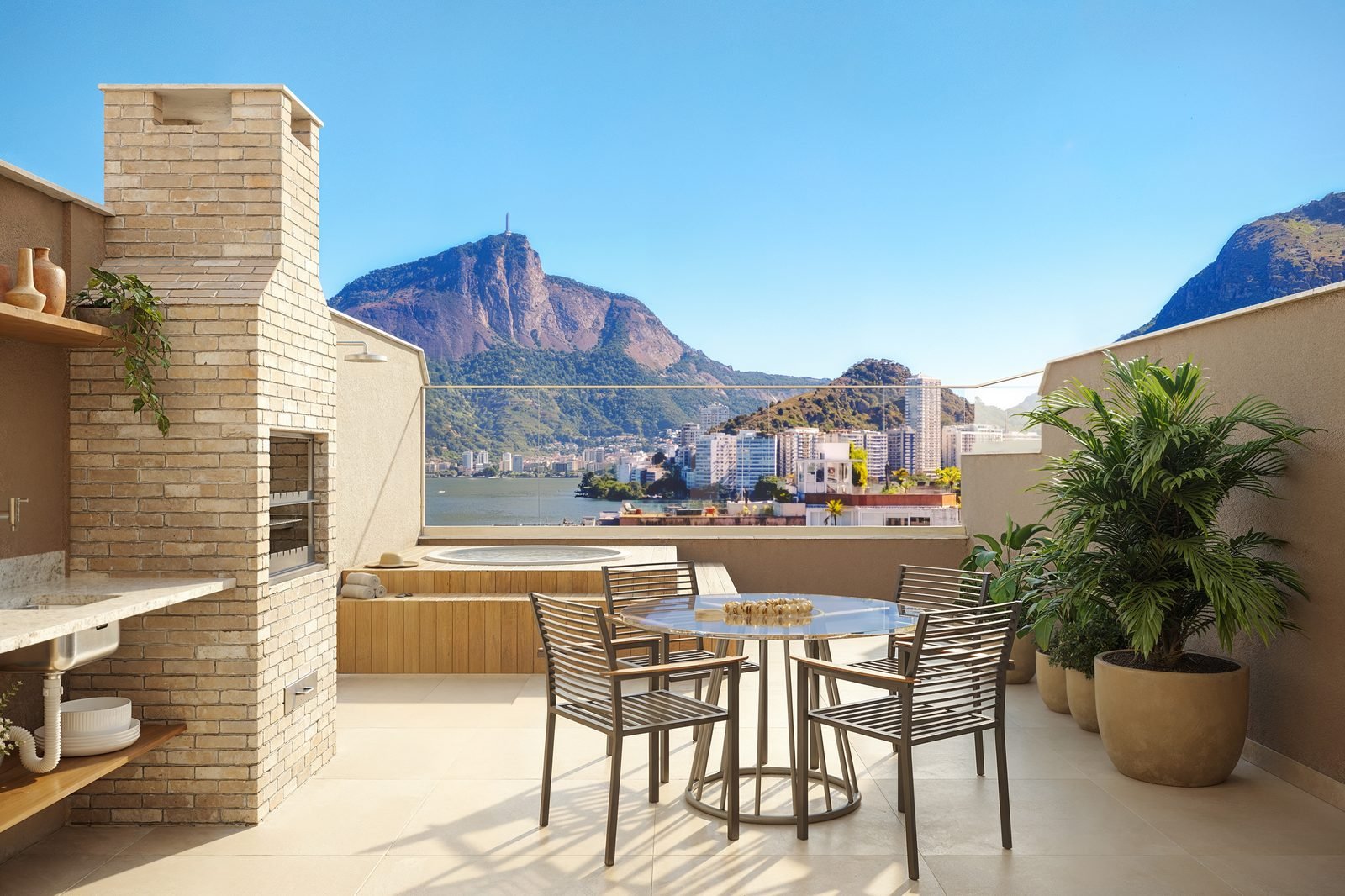 Terraço de cobertura do Be.in.Rio Nascimento Silva 387, com churrasqueira e vista para o Cristo Redentor