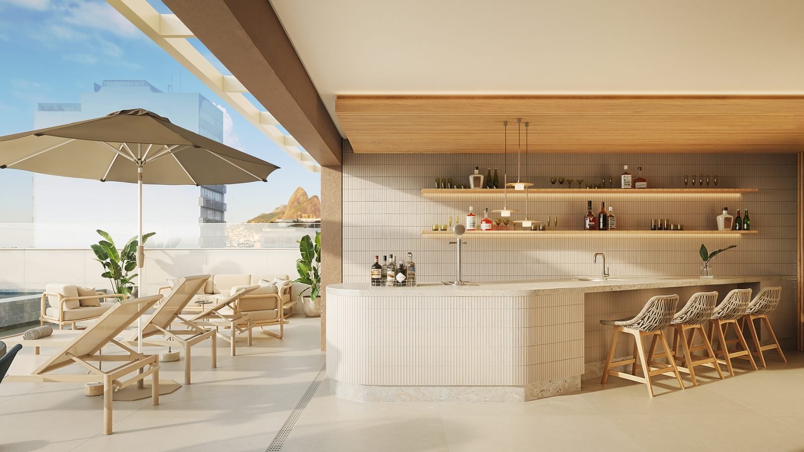 Lounge bar do rooftop do Be.in.Rio Prudente 589, com bancada, banquetas e ombrelone
