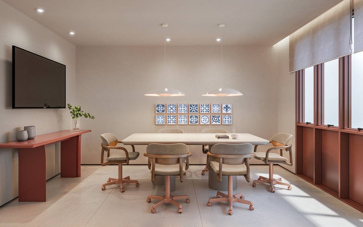 Sala de reunião do Bronze Ipanema Studios, com mesa para oito lugares e painel de azulejos