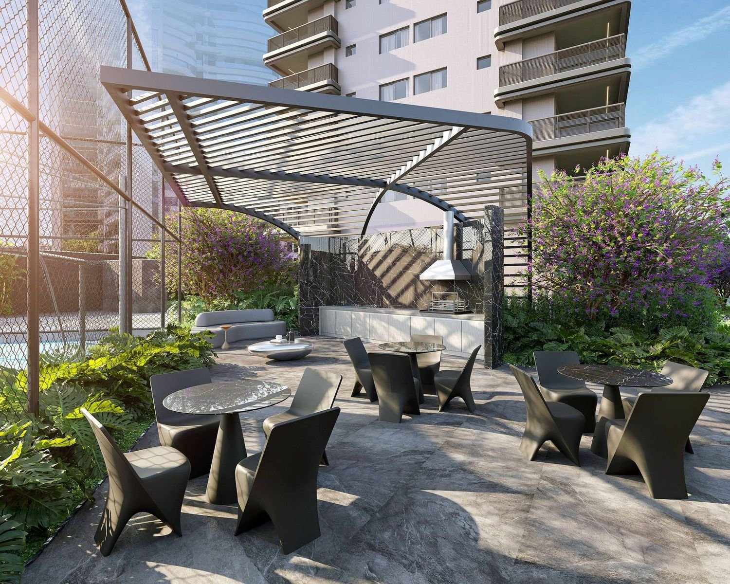 Lounge outdoor do Coupé Tower, com pergolado e jardim