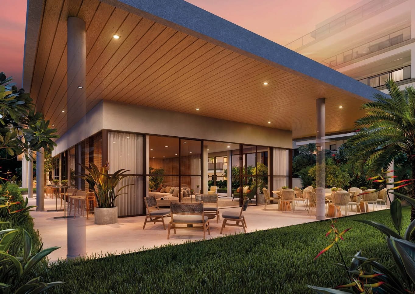 Fachada de um dos edifícios do Gaea Home Resort, com jardim no térreo