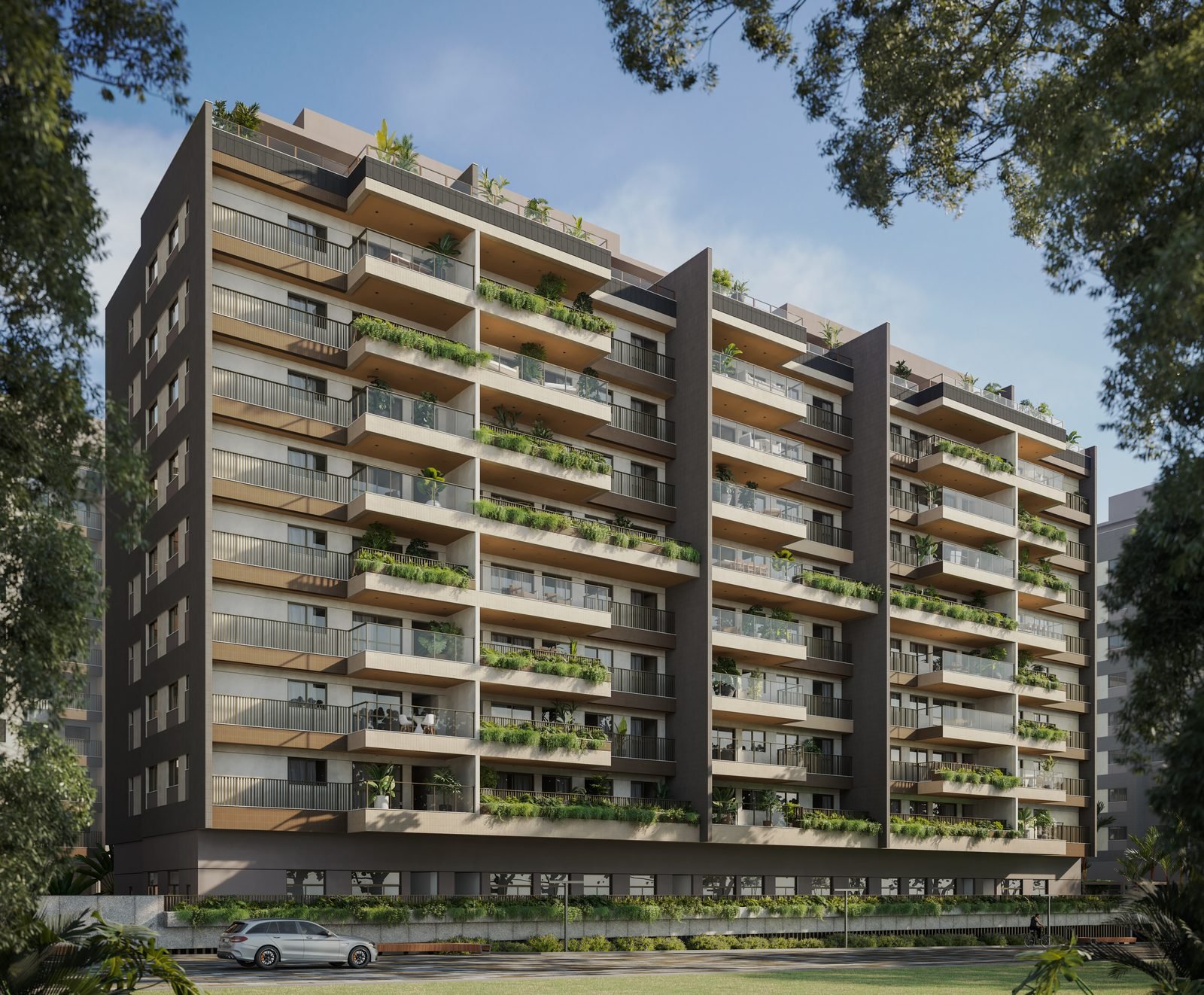 Fachada do Bloco 2 do Green Park Barra, com varandas e revestimento claro