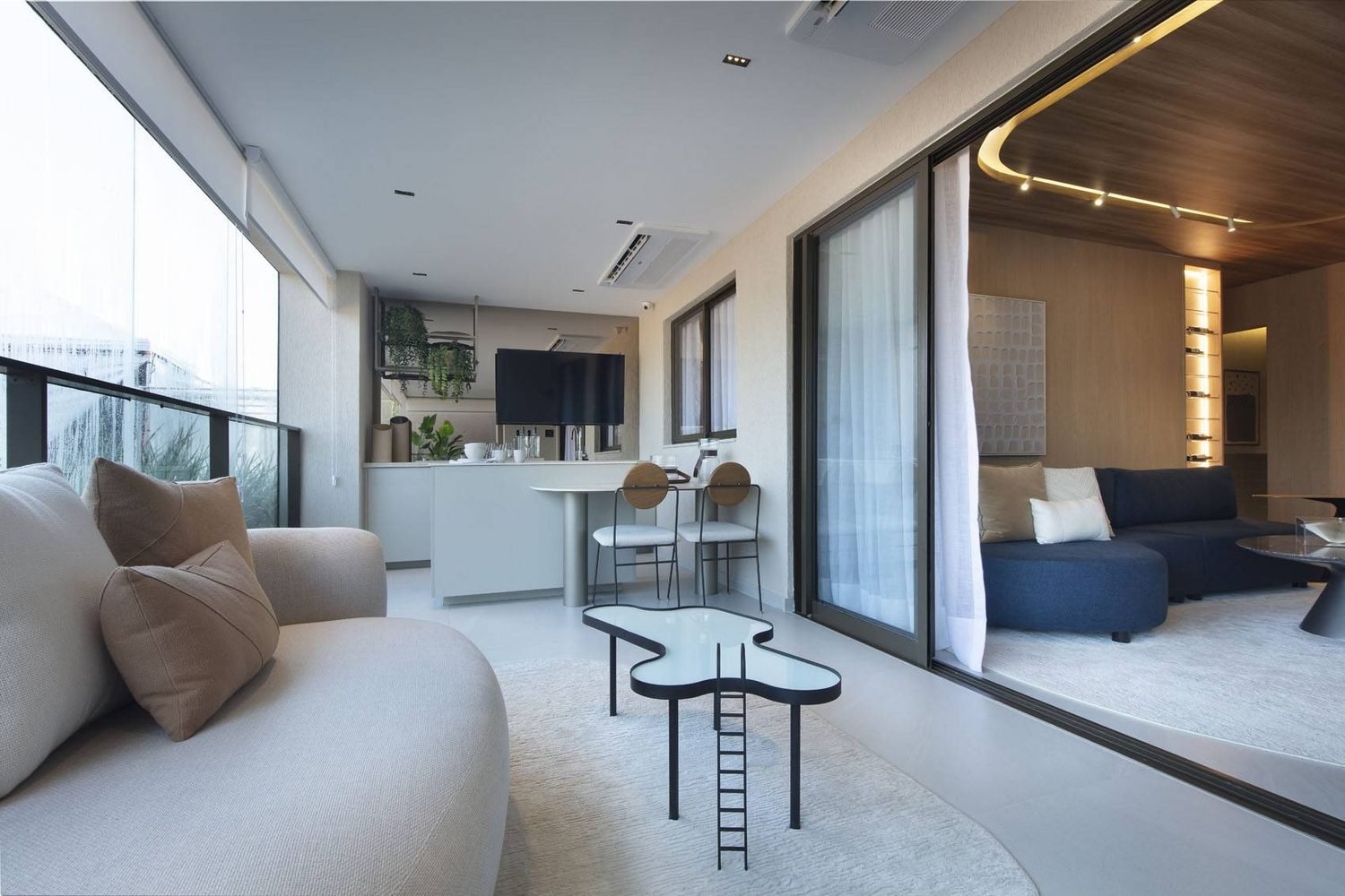 Living e varanda do decorado de 132 m² do Ox